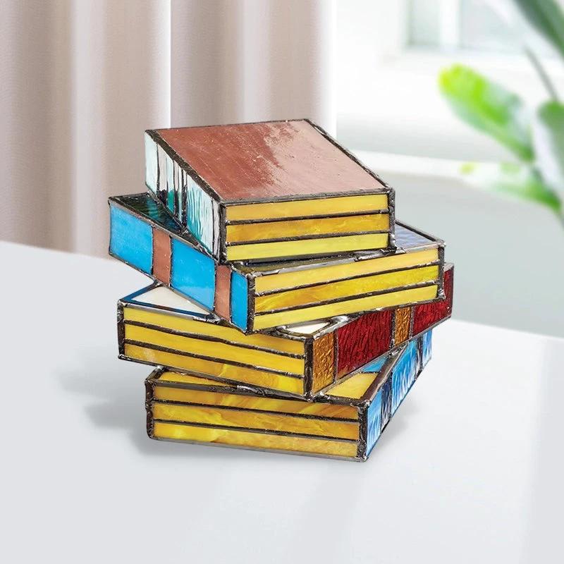 Lamp made of stacked books from stained glass by Bowlift