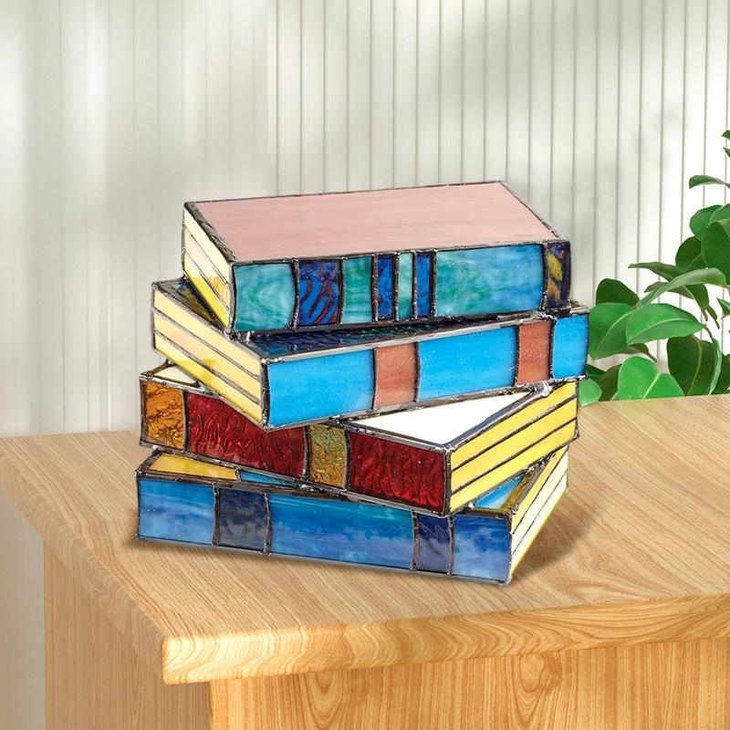 Lamp made of stacked books from stained glass by Bowlift