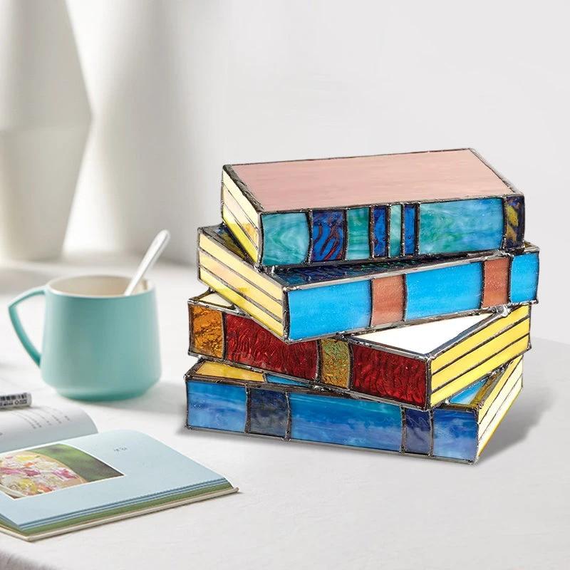 Lamp made of stacked books from stained glass by Bowlift