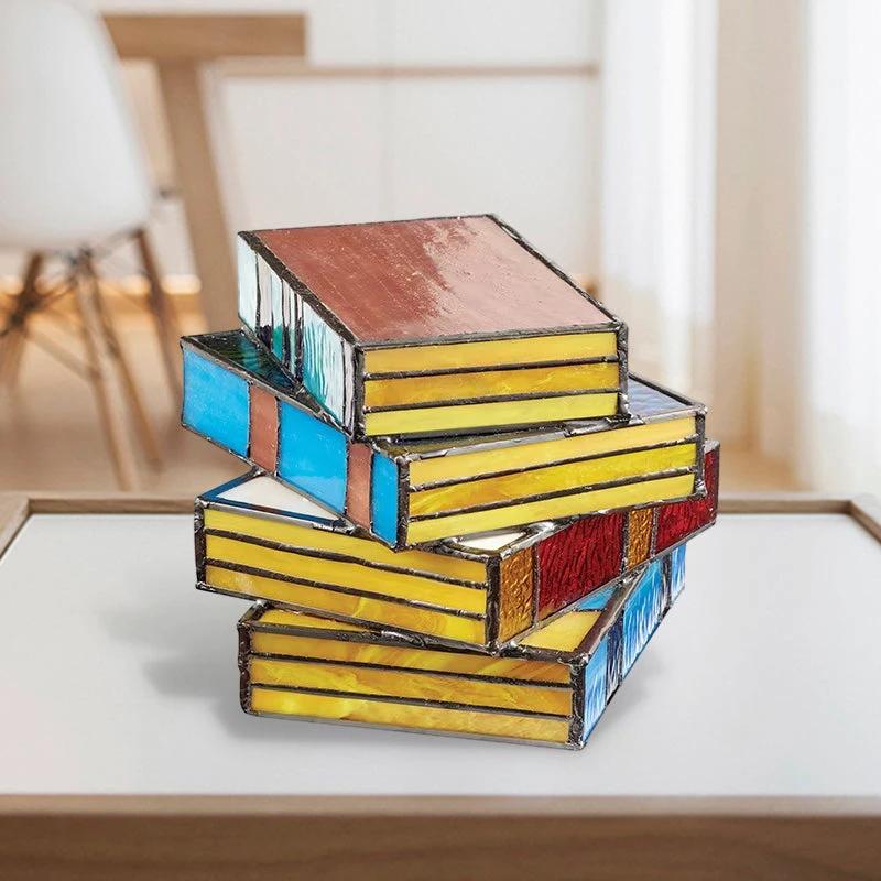 Lamp made of stacked books from stained glass by Bowlift