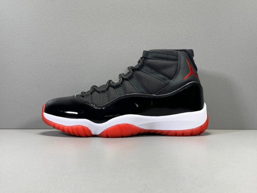 Air Jordan 11 Retro Playoffs Bred (2019) by Air Jordan