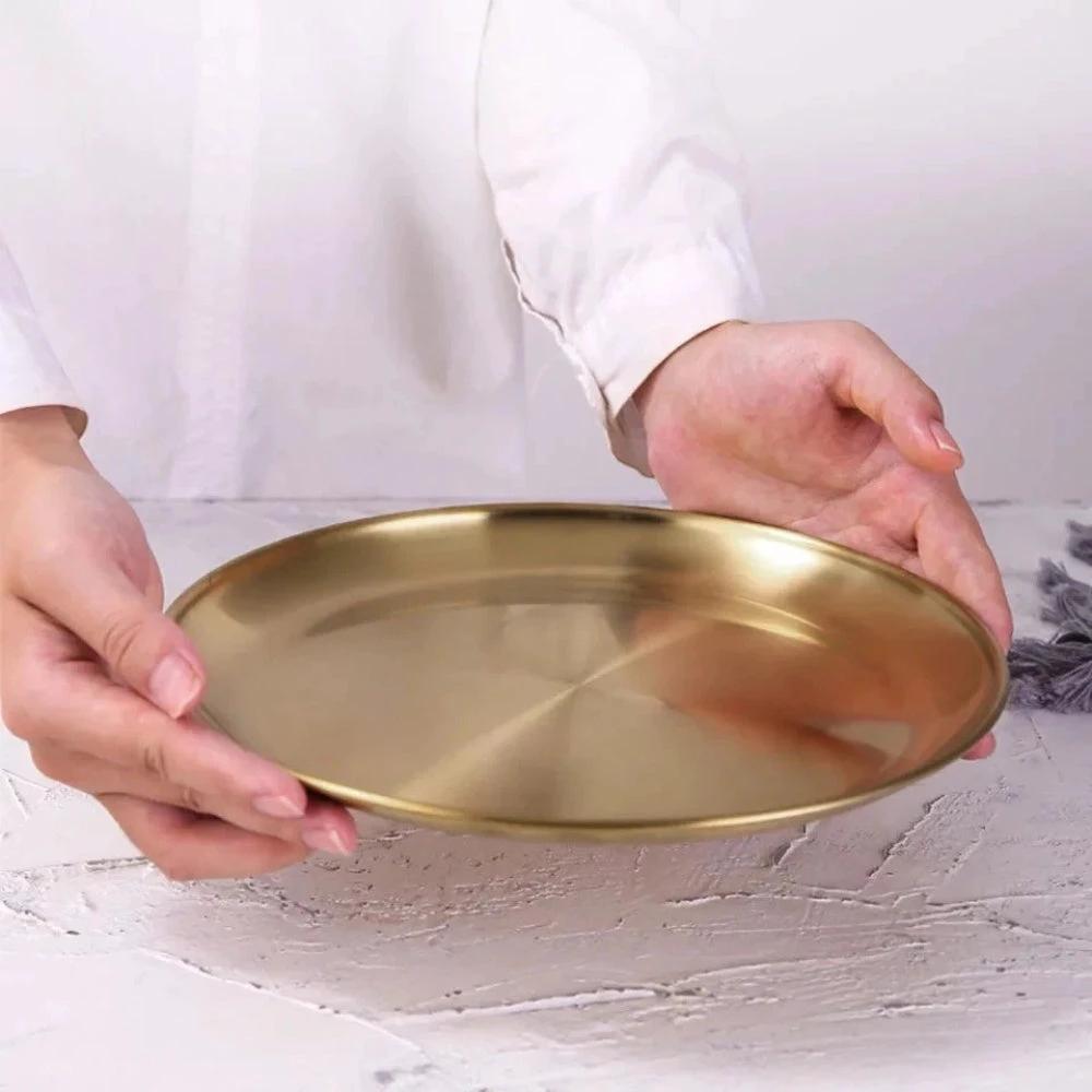 Lustrous Golden Stainless Steel Serving Plates by Casa & Beyond