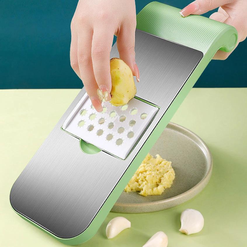 Multifunctional vegetable slicer by Bowlift