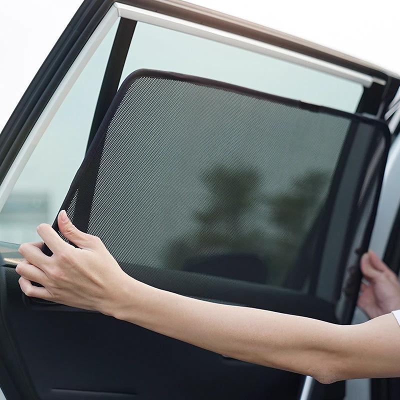 Magnetic holder for car window shade dispenser by Bowlift