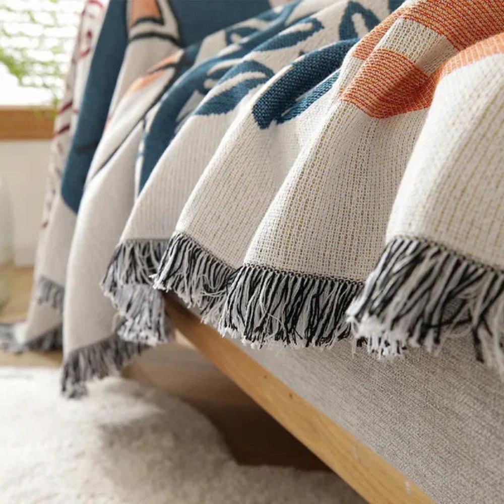 Tassel Tide All-Season Sofa Cover by Casa & Beyond