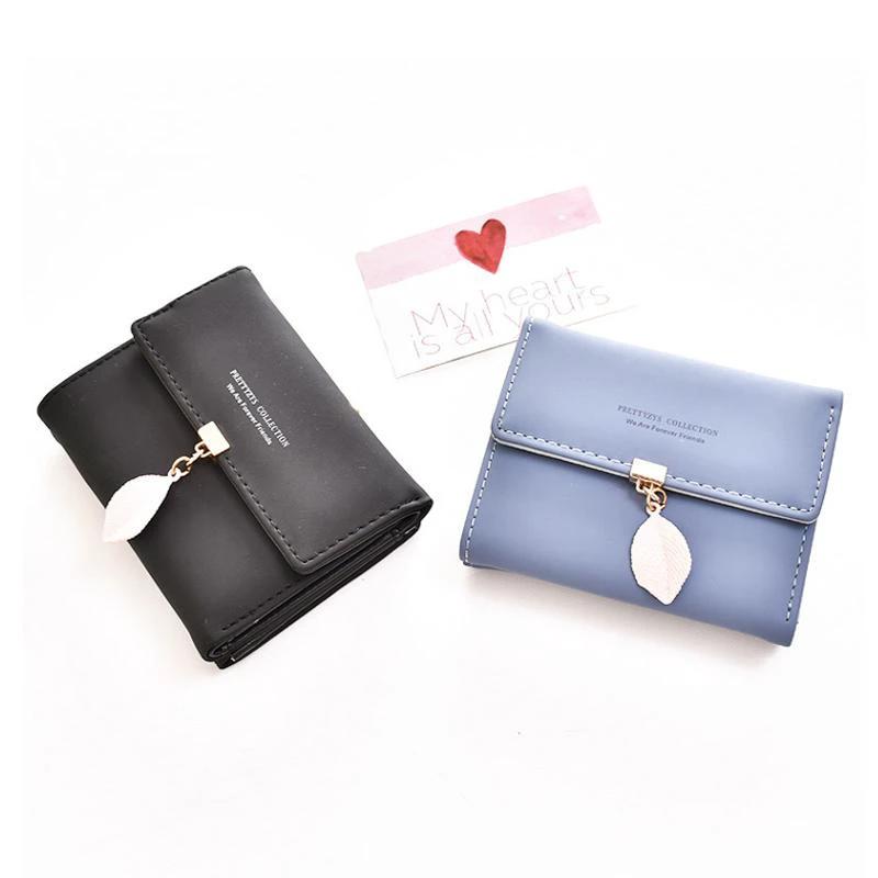 Short wallet with three folds and leaf decor by Bowlift