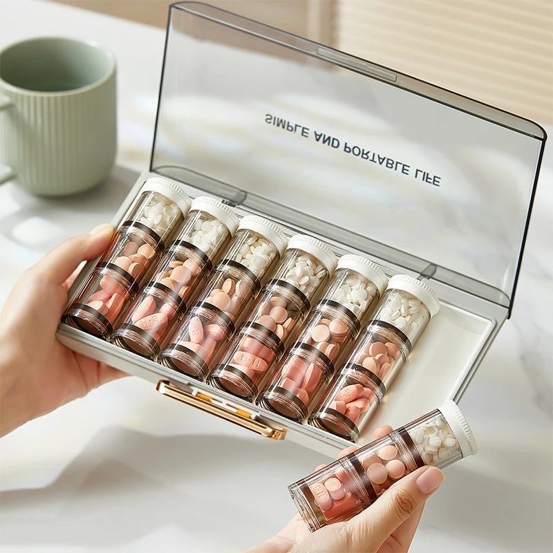 Portable high-capacity weekly pill organizer by Bowlift