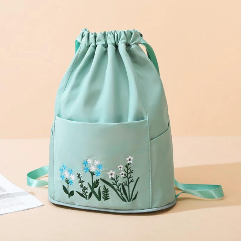 Multifunctional travel backpack with drawstring and embroidery by Bowlift