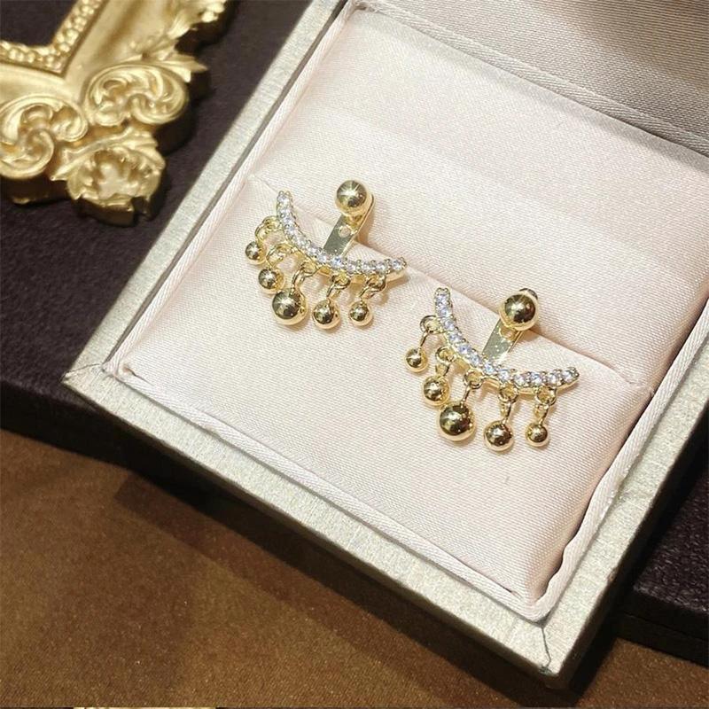 Geometric Meniscus Earrings made of Rhinestones and Pearls by Bowlift