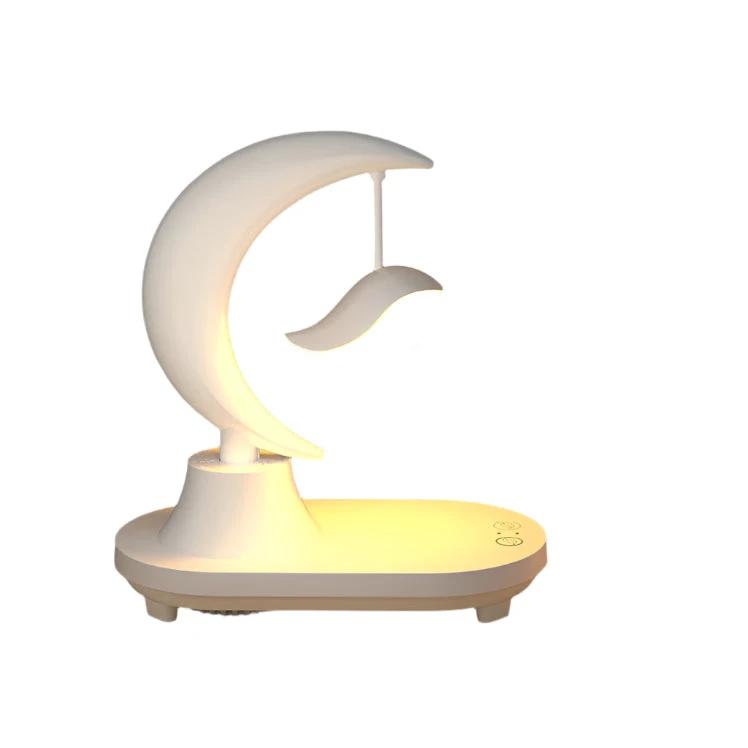 Moonsphere wireless LED lamp with Bluetooth speaker and charger Bowlift by Bowlift