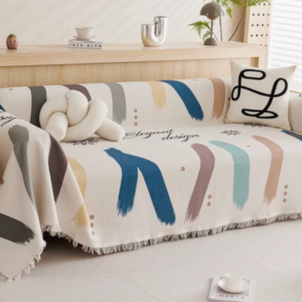 Lumiere Abstract Tasseled Sofa Cover by Casa & Beyond