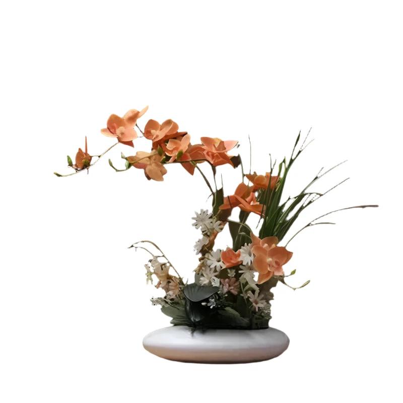 Lifelike flower arrangement in a modern vase Bowlift by Bowlift