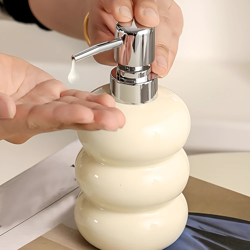 Sleek Sphere Dispenser by Casa & Beyond