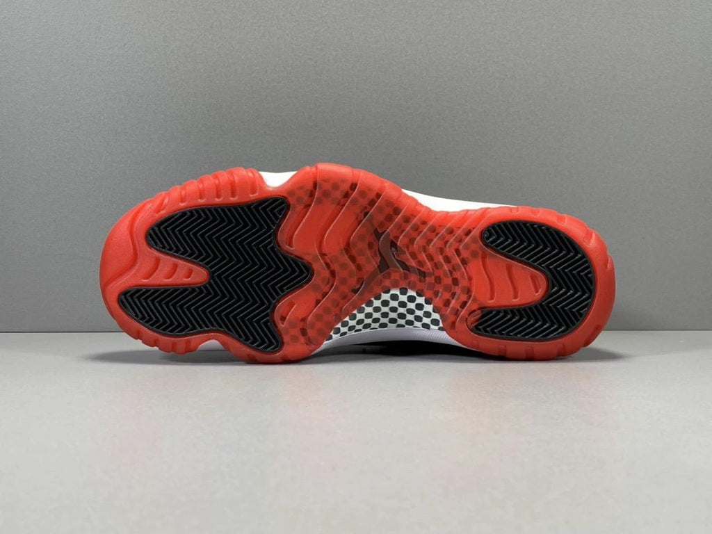 Air Jordan 11 Retro Playoffs Bred (2019) by Air Jordan