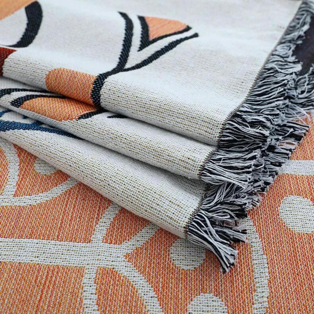 Tassel Tide All-Season Sofa Cover by Casa & Beyond