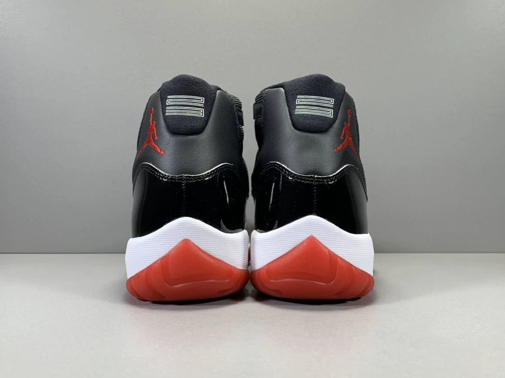 Air Jordan 11 Retro Playoffs Bred (2019) by Air Jordan