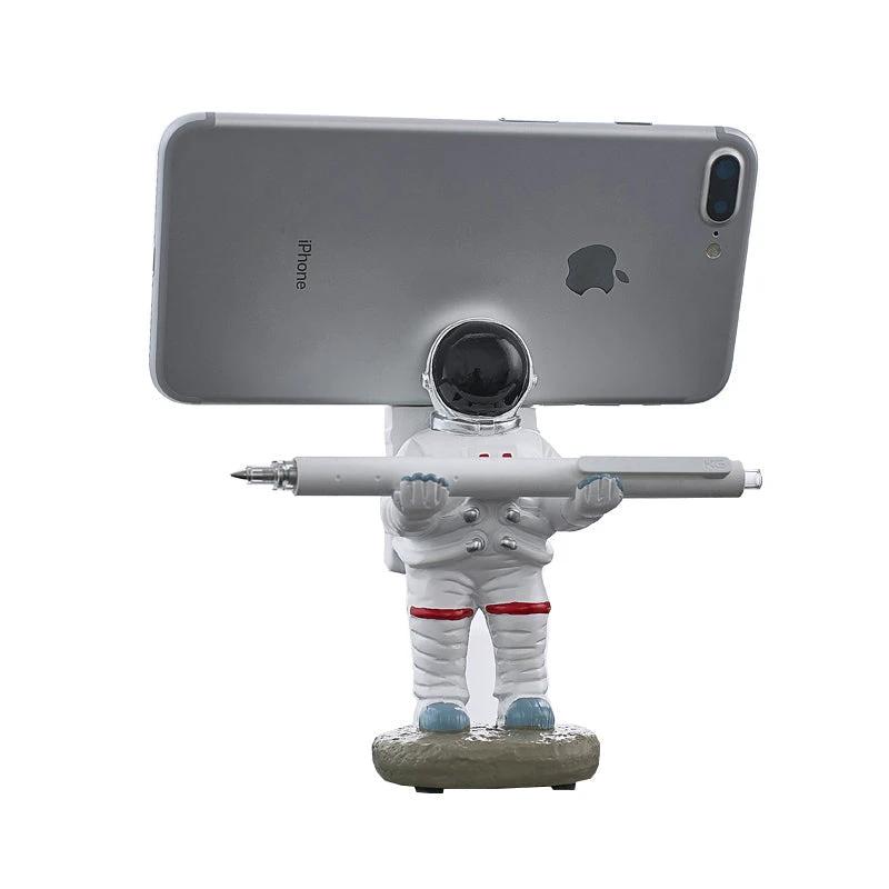 Support for phones or pens in astronaut decorations by Bowlift