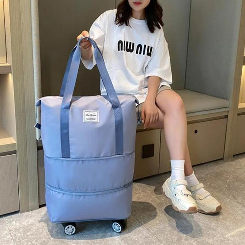 Travel bag with universal wheels by Bowlift