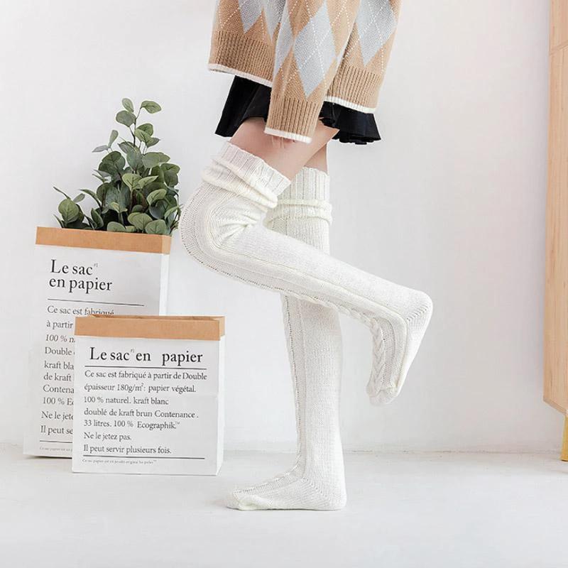 Hand-knit winter socks by Bowlift