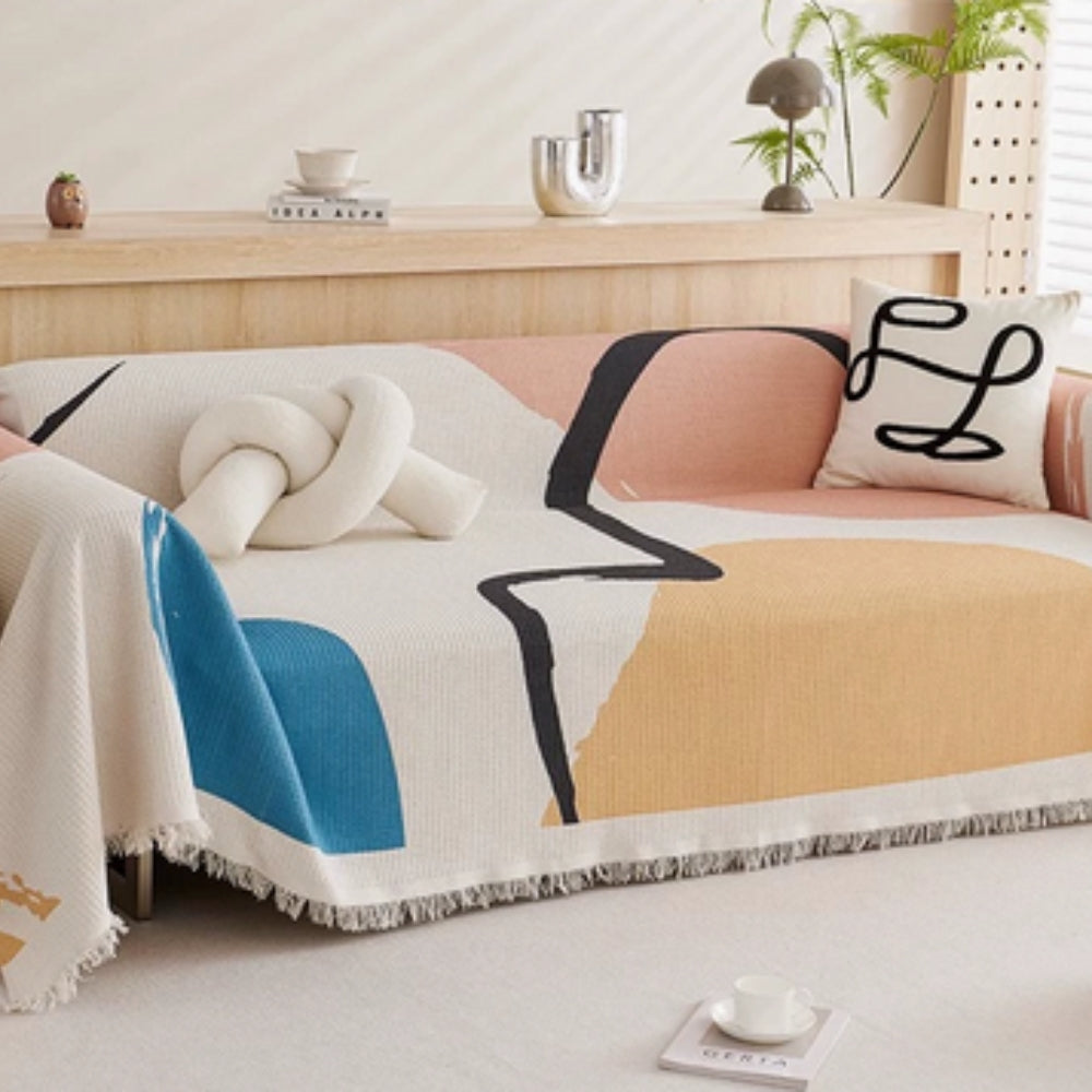 Lumiere Abstract Tasseled Sofa Cover by Casa & Beyond