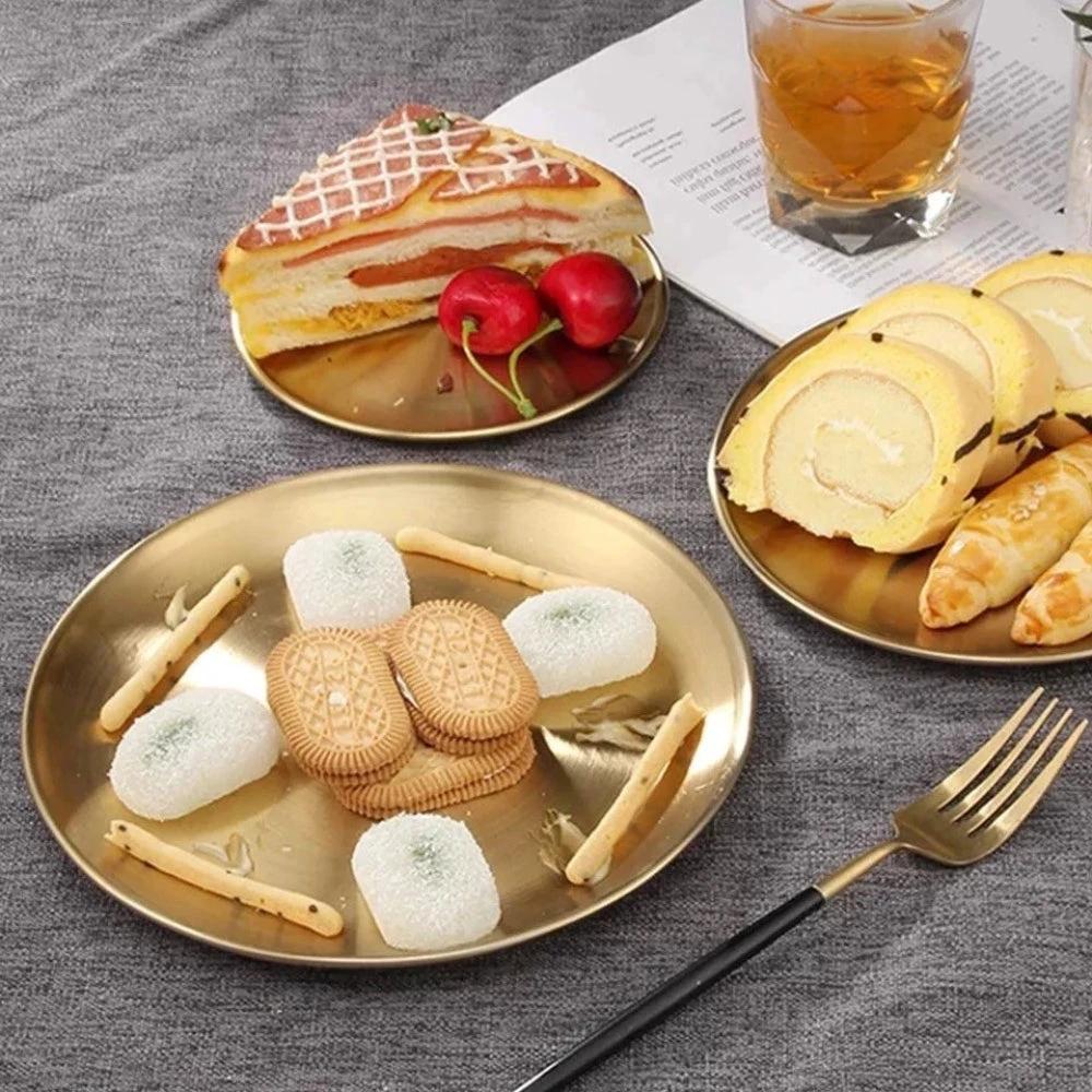 Lustrous Golden Stainless Steel Serving Plates by Casa & Beyond