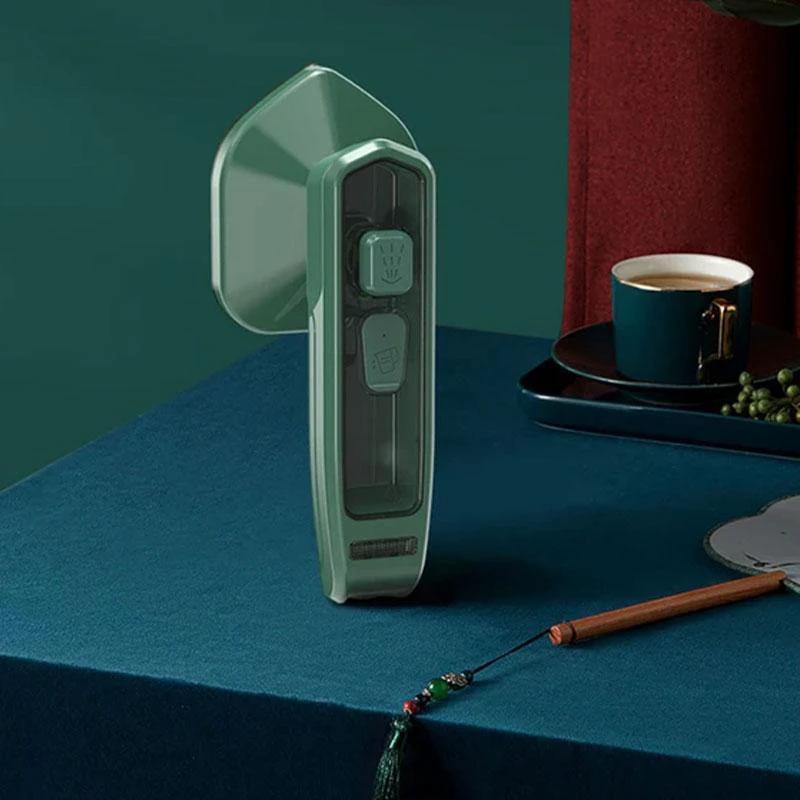 Portable steam iron by Bowlift