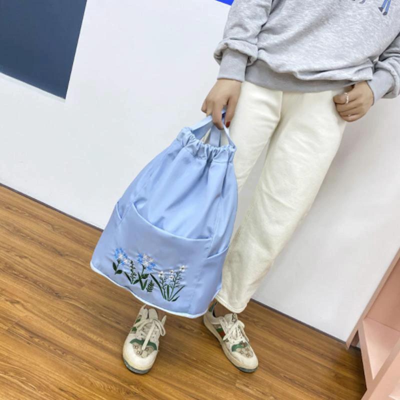 Multifunctional travel backpack with drawstring and embroidery by Bowlift