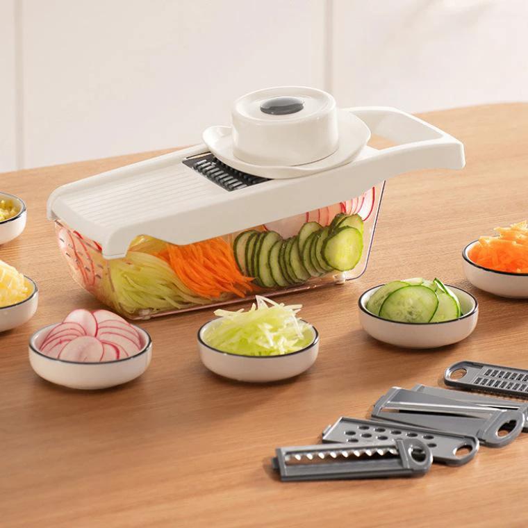Multi-purpose vegetable grater/shredder for home use by BowLift