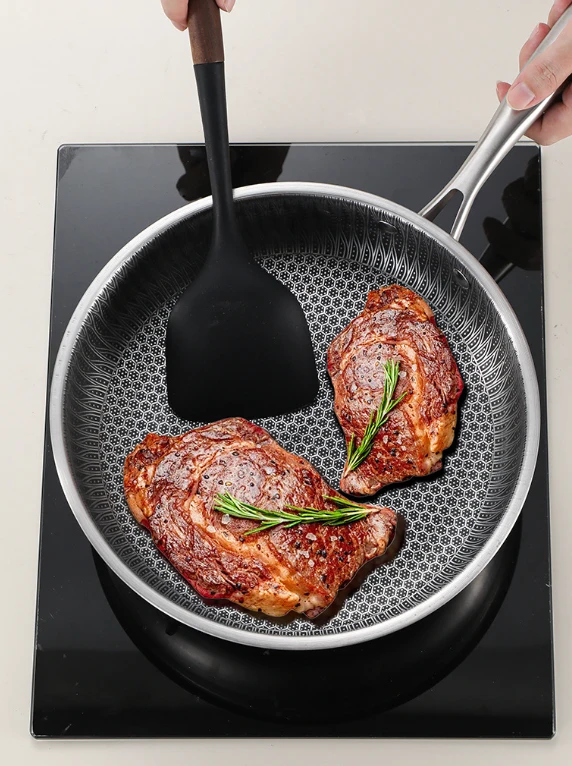 Stainless Steel Uncoated Non-stick Frying Pan by BowLift