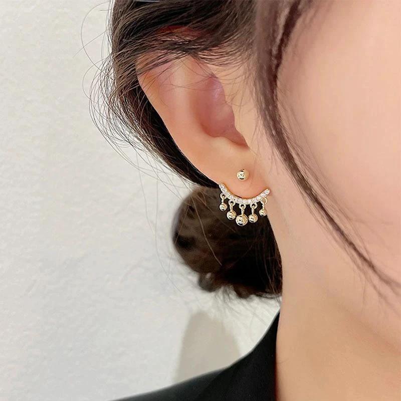 Geometric Meniscus Earrings made of Rhinestones and Pearls by Bowlift