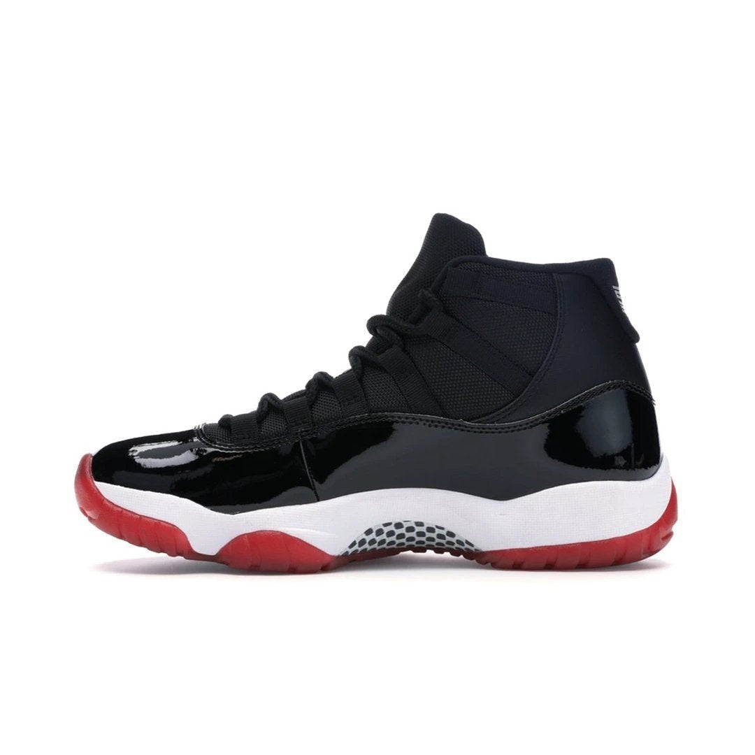 Air Jordan 11 Retro Playoffs Bred (2019) by Air Jordan