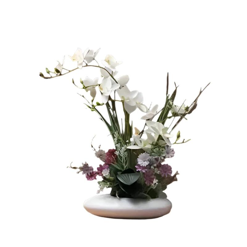 Lifelike flower arrangement in a modern vase Bowlift by Bowlift