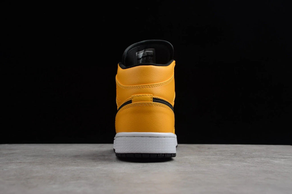 Air Jordan 1 Mid “Taxi Yellow” by Air Jordan