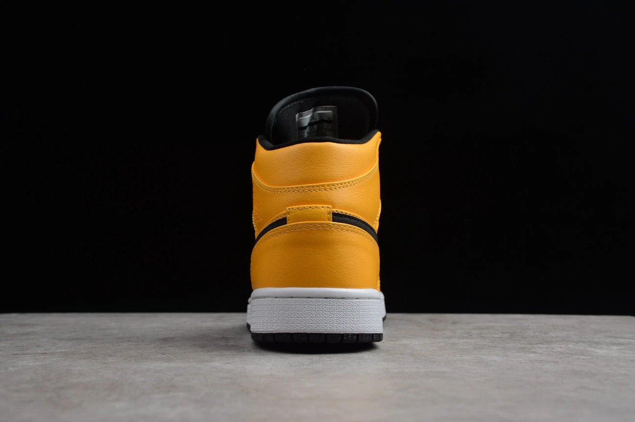 Air Jordan 1 Mid “Taxi Yellow” by Air Jordan