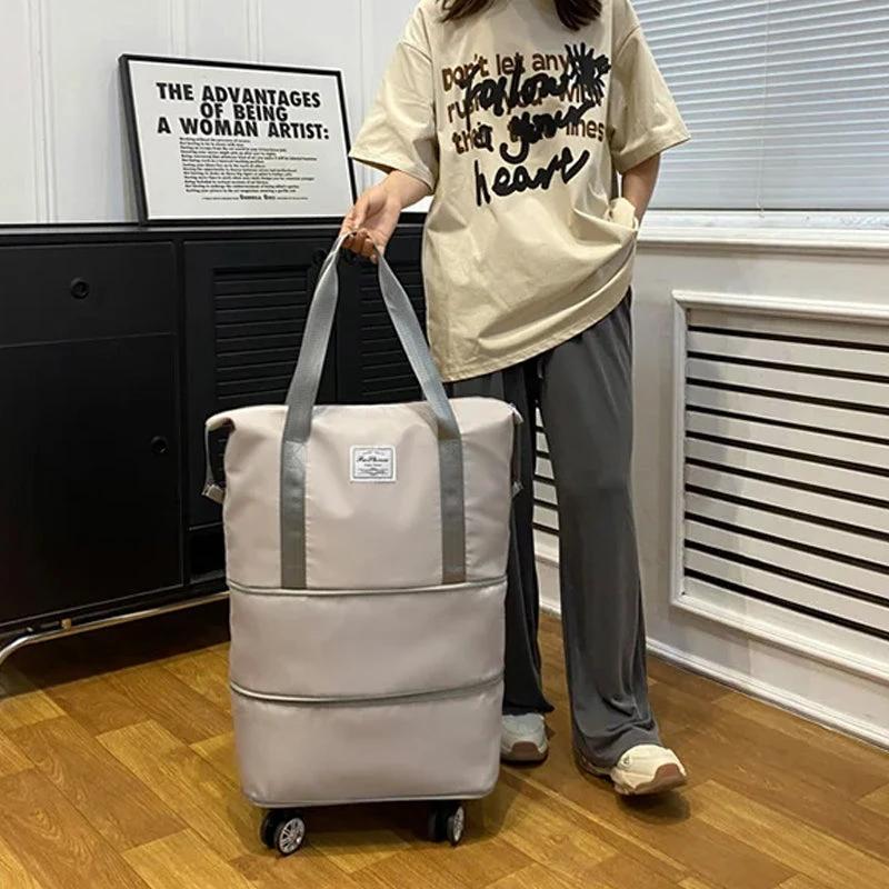 Travel bag with universal wheels by Bowlift