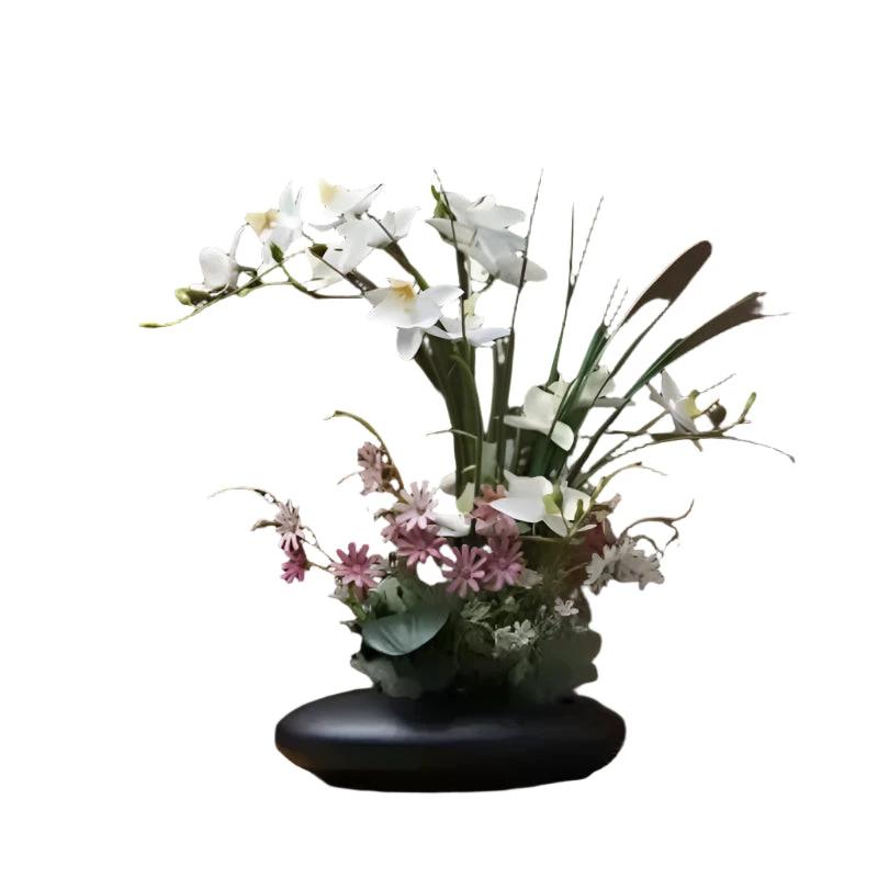 Lifelike flower arrangement in a modern vase Bowlift by Bowlift