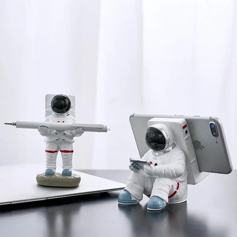 Support for phones or pens in astronaut decorations by Bowlift