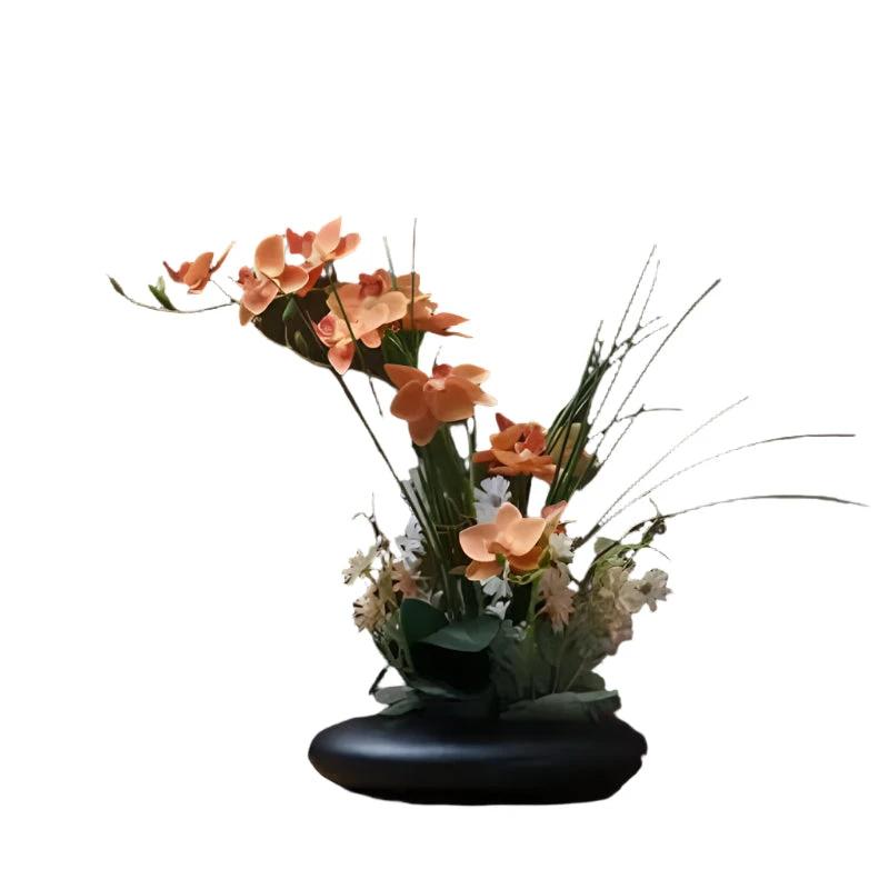 Lifelike flower arrangement in a modern vase Bowlift by Bowlift