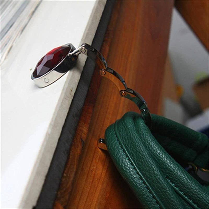 Portable Hanging Bag Holder by Bowlift