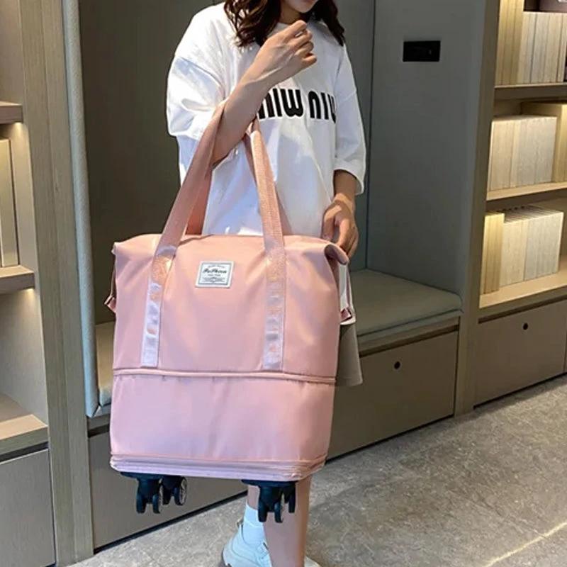 Travel bag with universal wheels by Bowlift