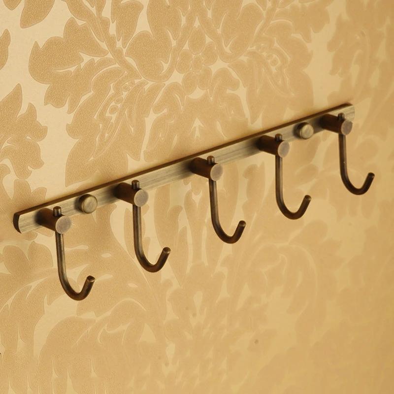 Worn Brass Traditional Bathroom Set with Bath Shelf/Paper Holder & Towel Bar by BowLift