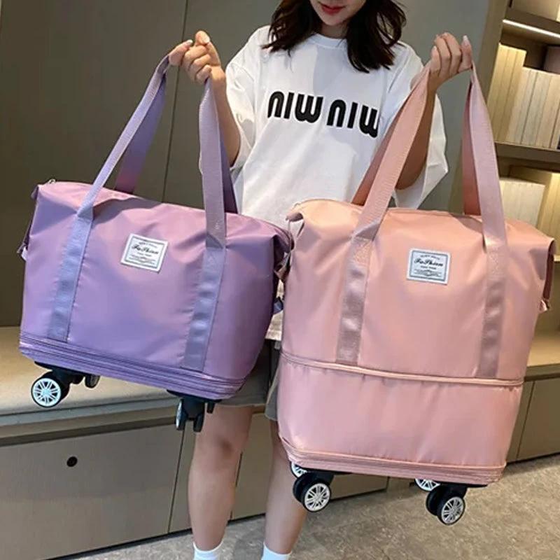 Travel bag with universal wheels by Bowlift