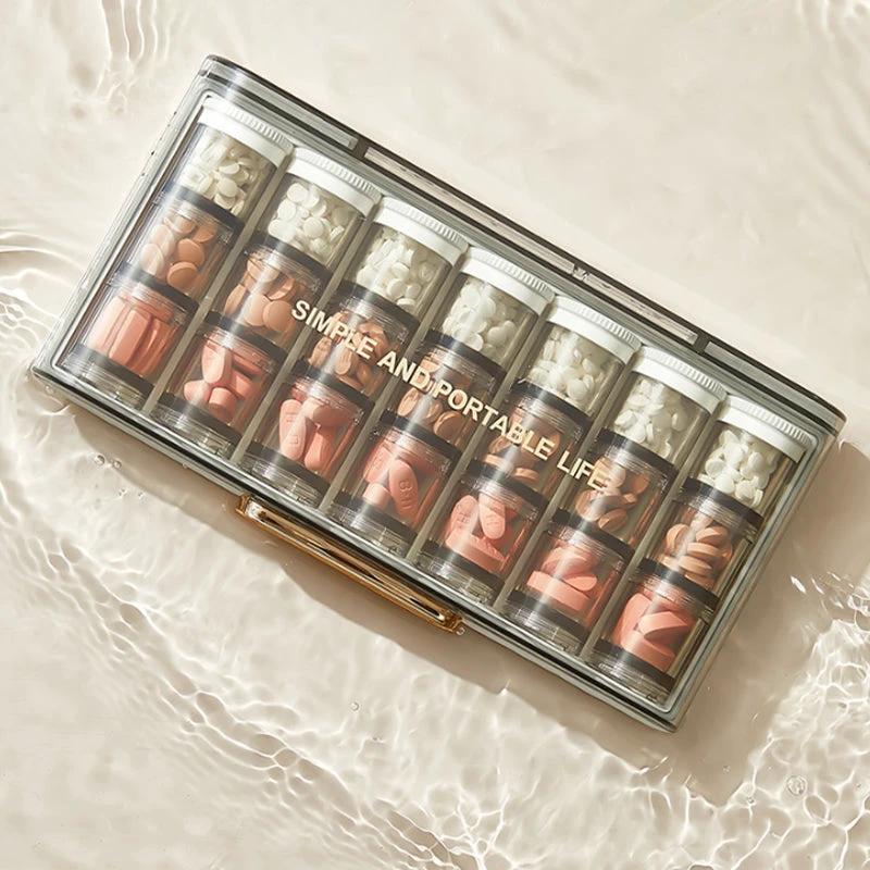 Portable high-capacity weekly pill organizer by Bowlift