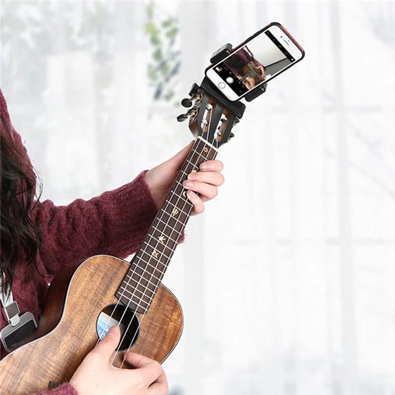 Guitar holder by Bowlift