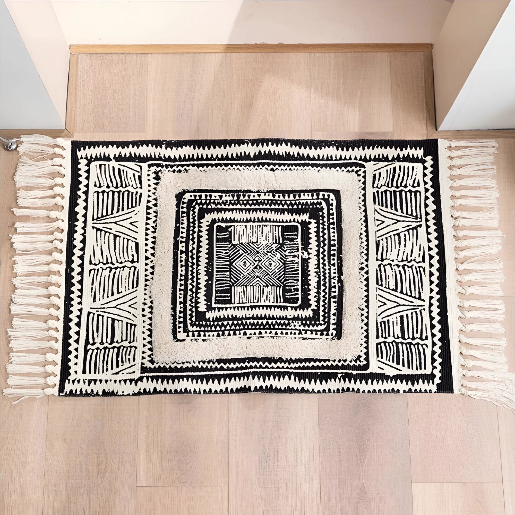 Black and White Geometric Tassel Floor Mat by Casa & Beyond