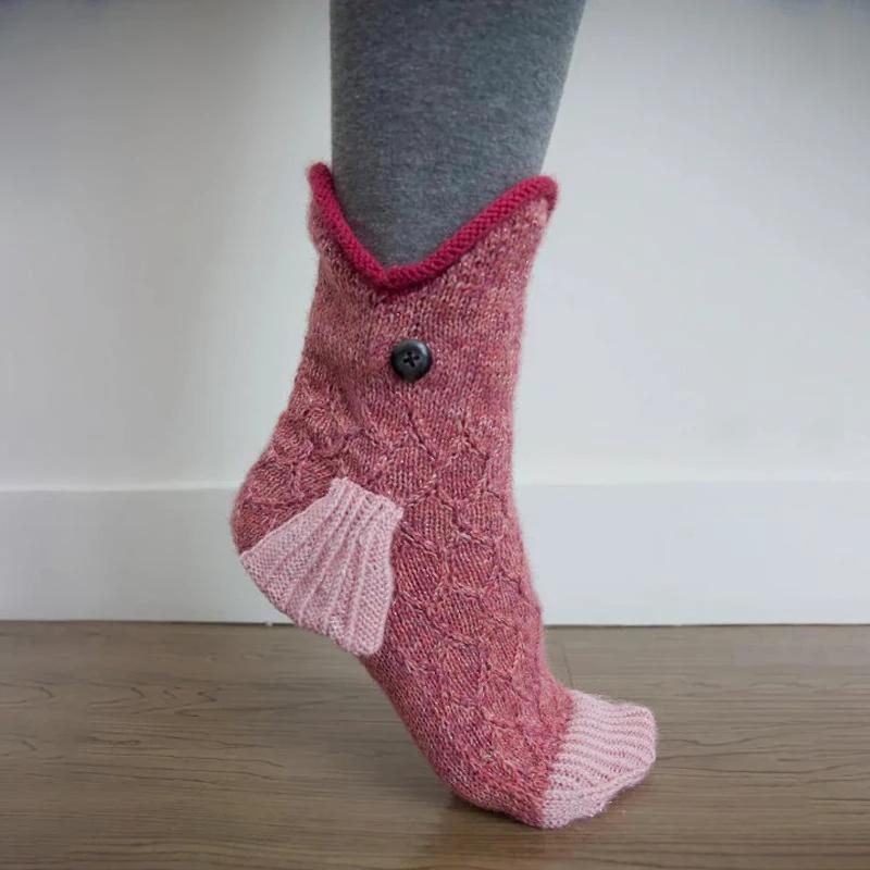 Socks in the shape of the cute animal knitted from wool by Bowlift