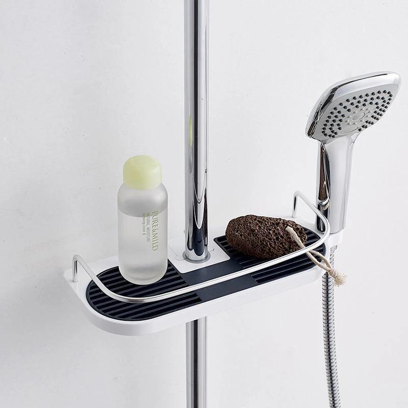 Multifunctional shower shelf by Bowlift