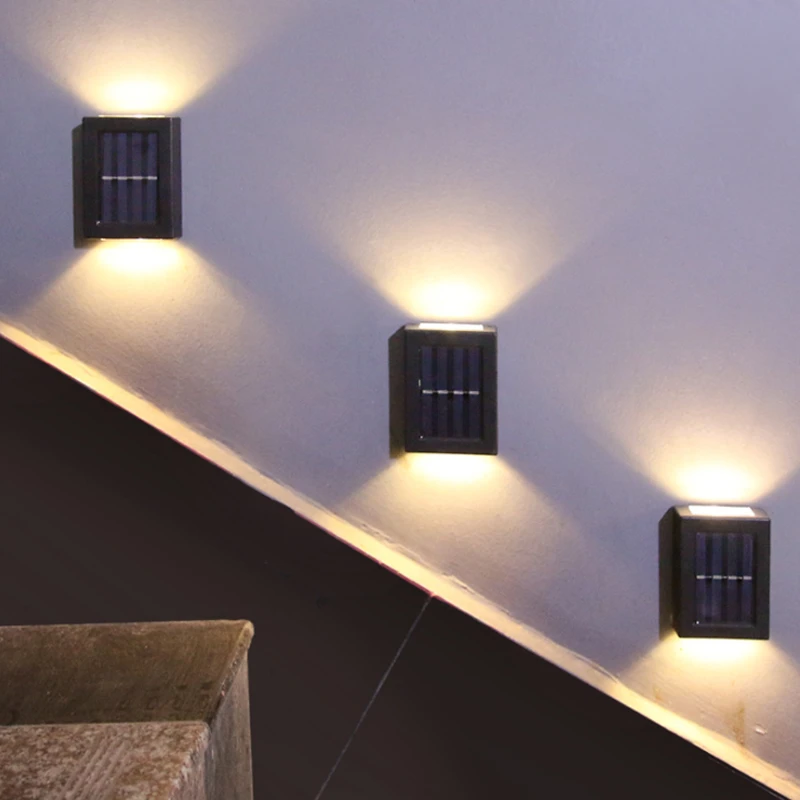 Solar Wall Lamp for Outdoor Areas by Bowlift