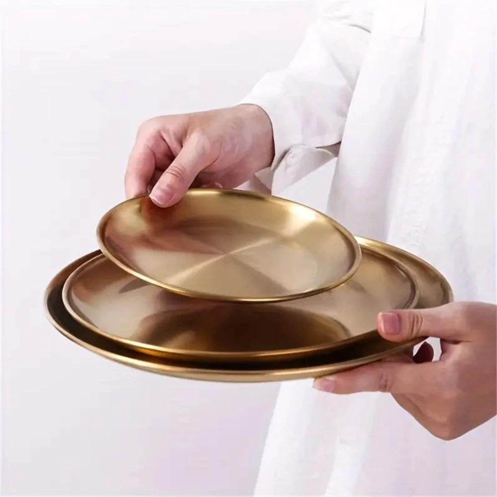 Lustrous Golden Stainless Steel Serving Plates by Casa & Beyond
