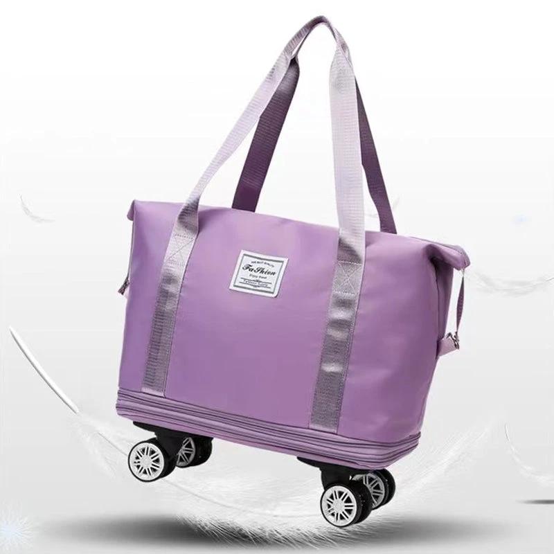 Travel bag with universal wheels by Bowlift